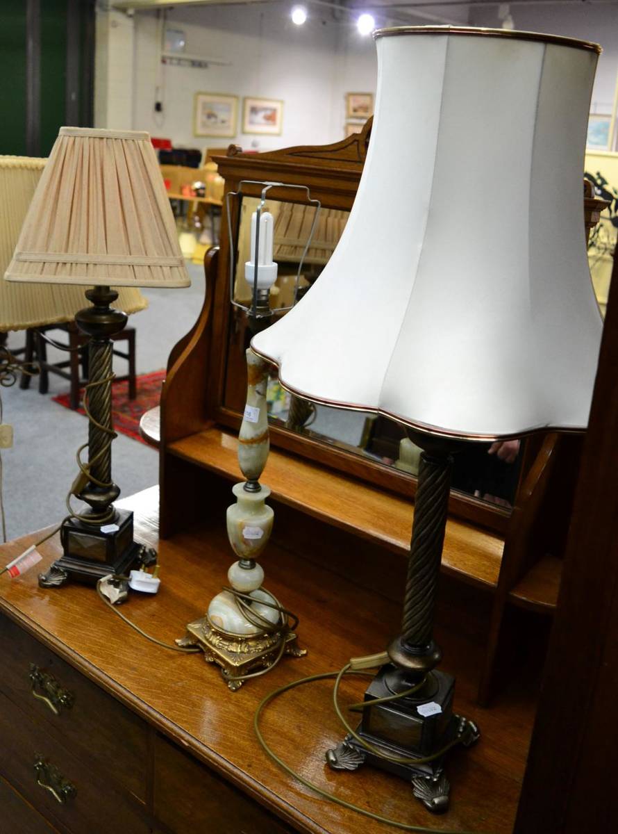 Lot 1116 - A pair of reproduction table lamps, a twin light standard lamp and another table lamp