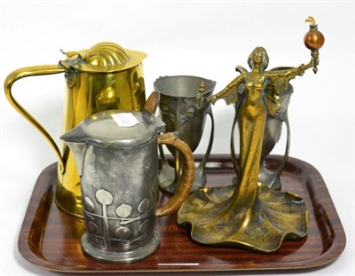 Lot 3 - A Liberty & Co pewter hot water jug, a pair of Continental pewter vases, an Art Nouveau figural...