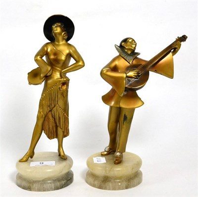Lot 9 - A pair of bronze figures modelled as a dancer and guitar player