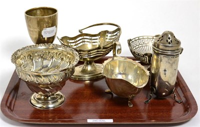 Lot 10 - A group of silver items comprising: a swing handled sugar basket, Chester 1897; a pedestal...
