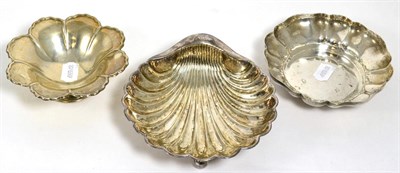 Lot 23 - A silver shell-shaped dish, Sheffield 1901; a flower shaped silver dish by Mappin & Webb and a...