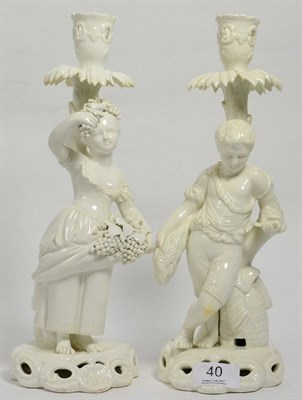 Lot 40 - A pair of Stevenson & Hancock candlestick figures (Derby)