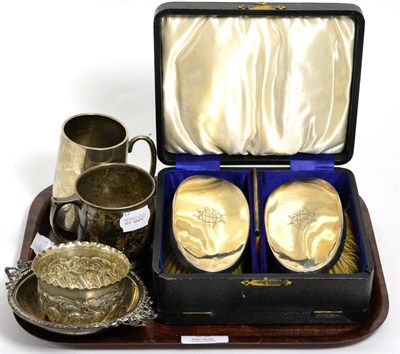 Lot 50 - A silver mug, James Dixon & Sons, 1942, another silver mug; a silver dish with ribbon and...
