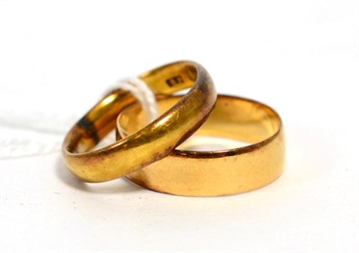 Lot 59 - An 18ct gold band ring and a 22ct gold band ring (2)