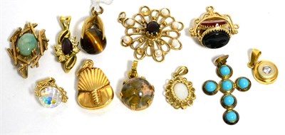 Lot 61 - A 9ct gold tiger's eye pendant, a 9ct gold jade pendant, eight other pendants and a hardstone...