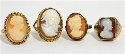 Lot 78 - A 9ct gold carved carnelian cameo ring, finger size L, and three carved shell cameo rings (5)