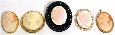 Lot 89 - A carved shell cameo brooch in a jet frame and four other cameo brooches (5)