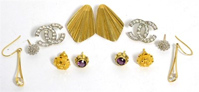 Lot 91 - A pair of 9ct gold diamond cluster earrings, a pair of 9ct gold fan shaped clip earrings, a pair of