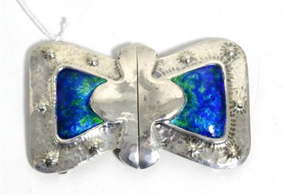 Lot 97 - A Liberty & Co silver and enamel buckle in the form of a bow, with hammered decoration and a...