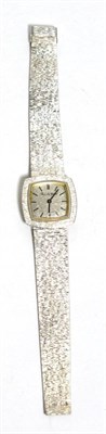 Lot 101 - A lady's 9ct white gold wristwatch signed Bueche Girod