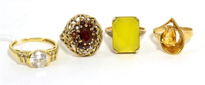 Lot 104 - A 14ct gold cubic zirconia set ring, a citrine ring stamped '14k', a paste set ring stamped...