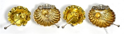 Lot 107 - A pair of silver shell form salts with gilt interiors, some similar spoons, together with...