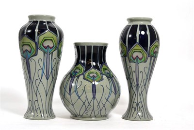 Lot 122 - Three Moorcroft Peacock Parade vases