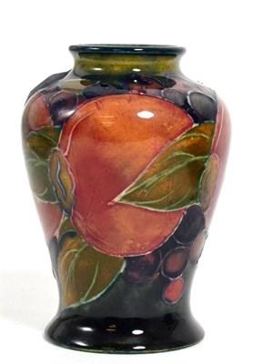 Lot 126 - A William Moorcroft small pomegranate pattern vase