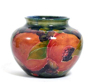 Lot 127 - A William Moorcroft small pomegranate pattern vase