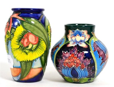 Lot 142 - Moorcroft pottery: a Saadian pattern vase designed by Shirley Hayes, 8.5cm high (boxed);...