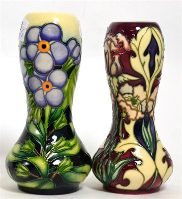 Lot 143 - A Moorcroft pottery ";Masquerade"; pattern vase, together with a Moorcroft ";Forget Me Not";...