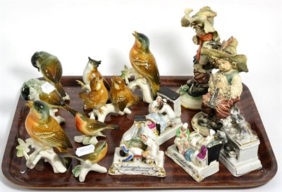 Lot 167 - A tray including four Fairings, eight Karl Ens porcelain birds and two Capodimonte type figures