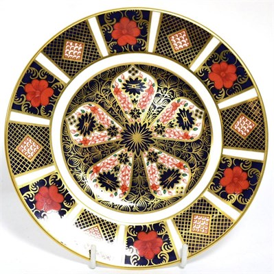 Lot 186 - A Robert ";Mouseman"; Thompson oak ashtray together with a Royal Crown Derby Imari plate