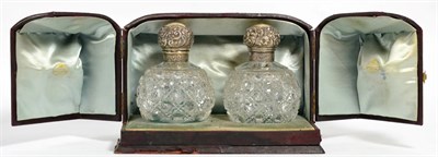 Lot 190 - A pair of silver mounted cut glass spherical scent bottles, Goldsmiths & Silversmiths, London, 1895