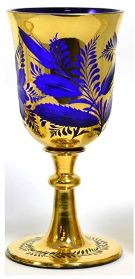 Lot 203 - A 19th century gilt and blue flash glass goblet