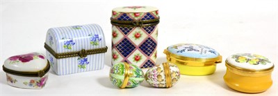 Lot 208 - Two Halcyon Days enamel boxes, two further eggs and three other porcelain boxes (7)