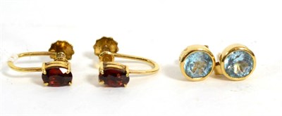 Lot 218 - A pair of 9ct gold aquamarine stud earrings and a pair of citrine screw back earrings