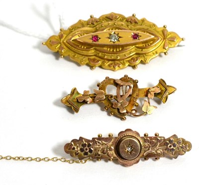 Lot 230 - A Victorian 9ct gold gem set brooch and two other Victorian brooches (3)