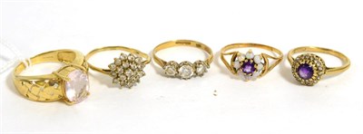 Lot 234 - A 9ct gold pink stone ring, finger size N1/2 and four 9ct gold gem set rings (5)