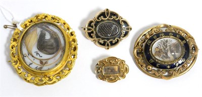 Lot 241 - Four mourning brooches