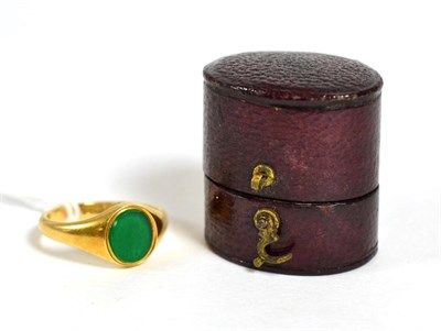 Lot 263 - An 18ct gold green stone inset signet ring, finger size L1/2