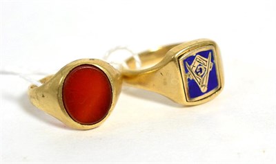 Lot 267 - A 9ct gold Masonic ring, finger size S1/2 and a 9ct gold singet ring, finger size M (2)