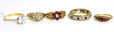 Lot 288 - A 9ct gold garnet cluster ring, finger size N and four 9ct gold gem set rings (5)