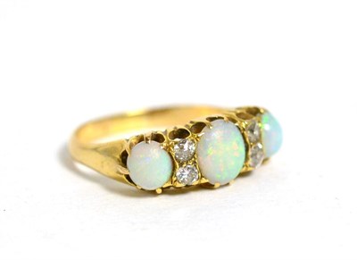 Lot 290 - Opal and diamond ring