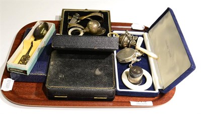 Lot 319 - Three silver and mother of pearl baby rattles, a silver mounted cheroot cutter, a small silver box