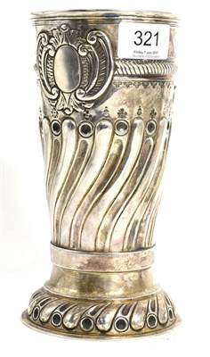 Lot 321 - A silver beaker vase with wrythen body, indistinct marks, 20cm high