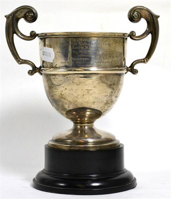 Lot 325 - Silver two-handled presentation trophy cup, ebonised base