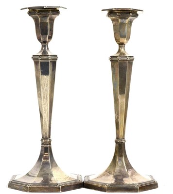 Lot 330 - Pair of loaded silver candlesticks, Sheffield hallmark