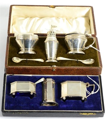 Lot 336 - Two cased Art Deco silver three piece cruet sets, Chester 1921 and Sheffield 1937 (2)