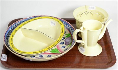 Lot 366 - Creamware twin handled bowl, creamware dish, jug and a polychrome decorated dish (4)