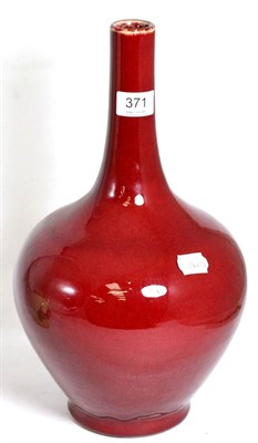 Lot 371 - A sang de boeuf bottle vase