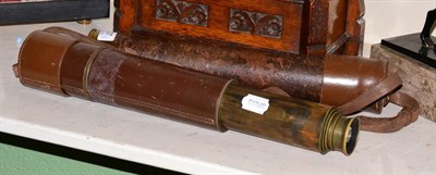 Lot 437 - A four draw telescope, leather bound; together with another