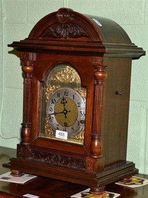 Lot 455 - A mahogany bracket clock, the arched dial flanked by fluted supports