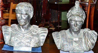 Lot 461 - After the Antique, a pair of patinated cast metal busts of Romans