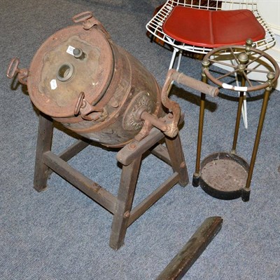 Lot 1078 - A butter churn on stand and a circular stick stand