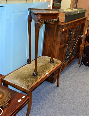 Lot 1102 - A reproduction oak side cabinet with glazed and panel doors together with a corner table and a...