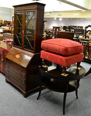 Lot 1108 - A modern foot stool and a reproduction cross banded mahogany astragal glazed bureau bookcase,...