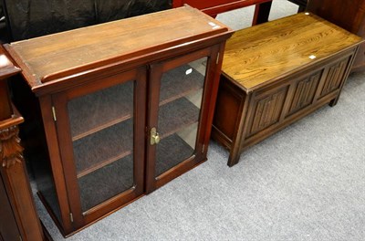 Lot 1119 - A reproduction oak Jaycee coffer and a small glazed bookcase