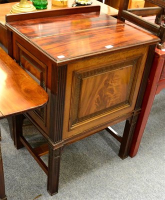 Lot 1124 - A mahogany drinks cabinet with hinged top and fall front