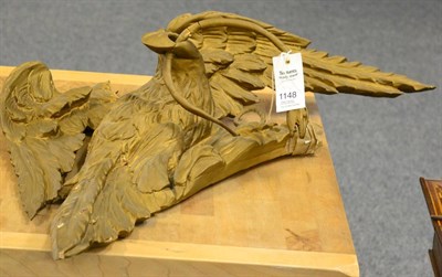 Lot 1148 - A carved giltwood eagle surmount (a.f)